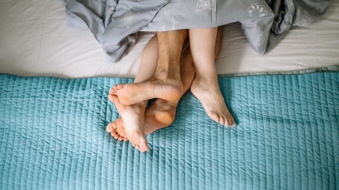 overcoming sex anxiety couple bed